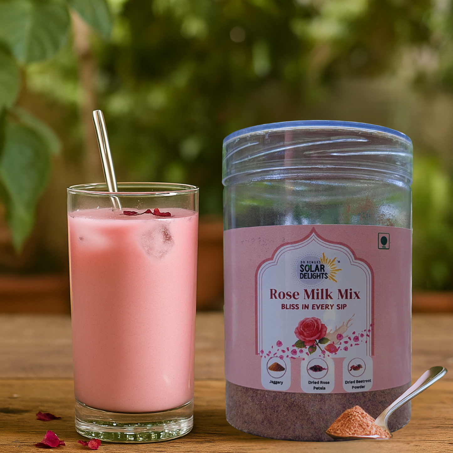Glass of creamy pink rose milk served as a natural summer refreshment