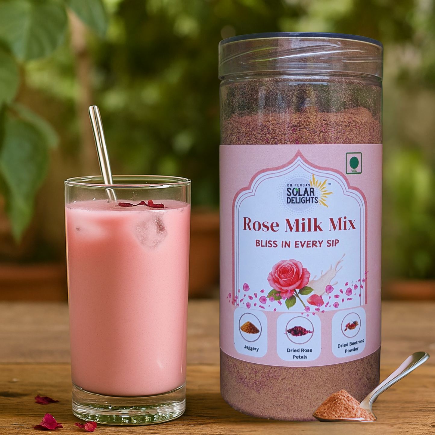 Glass of creamy rose milk prepared from natural mix