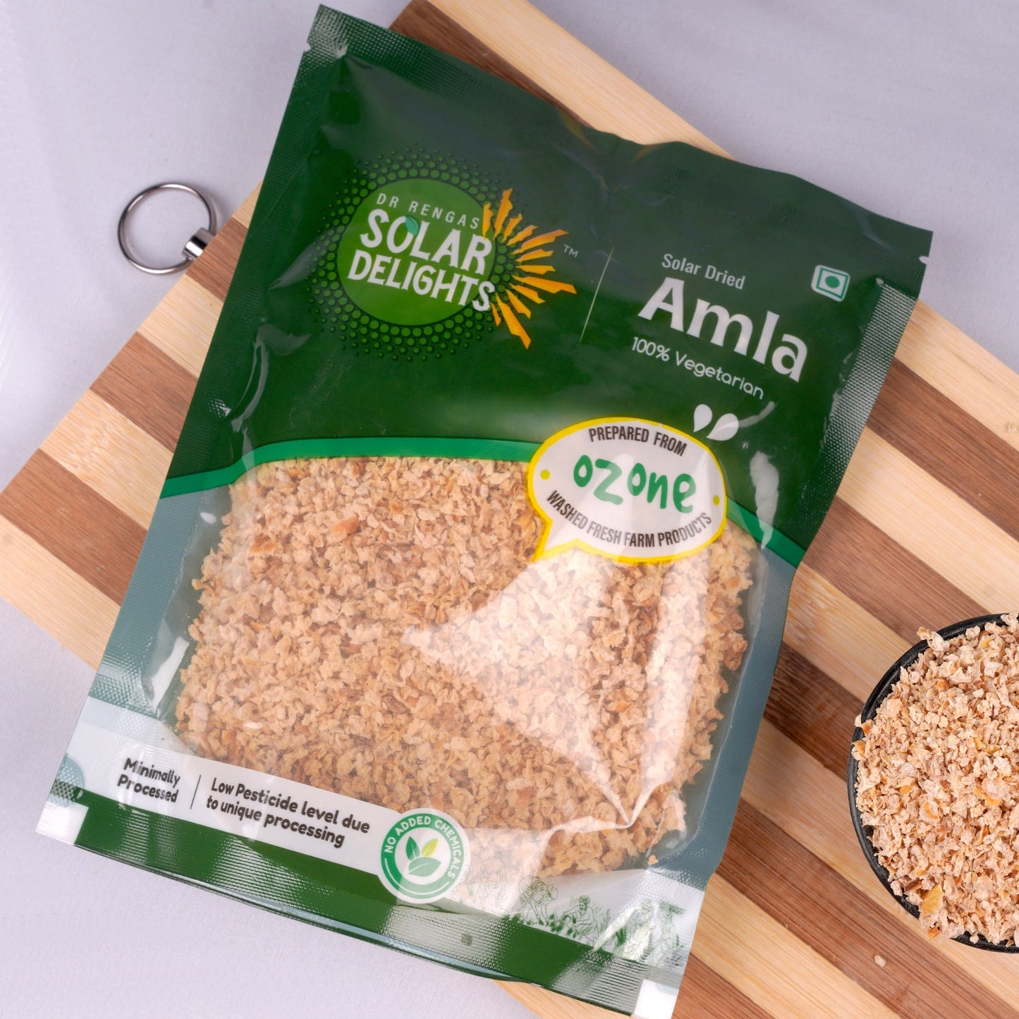 Lifestyle shot with amla snack served alongside herbal tea