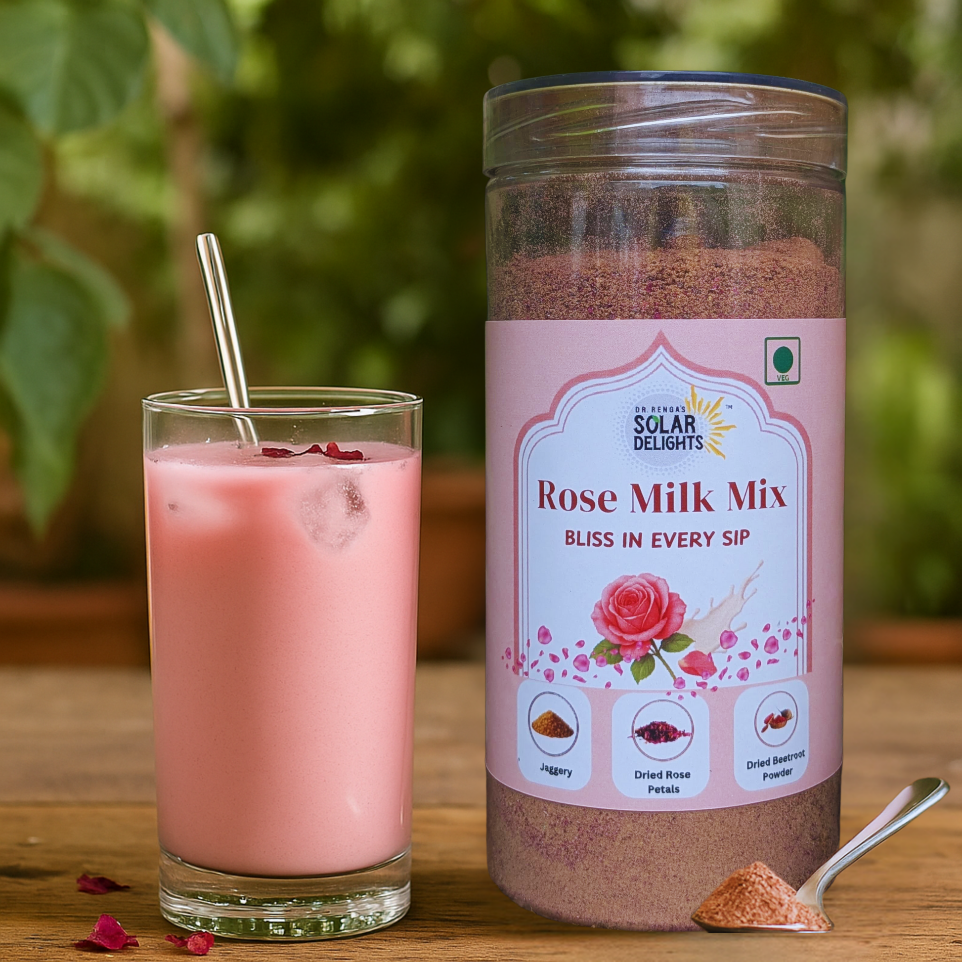 Glass of creamy rose milk prepared from natural mix