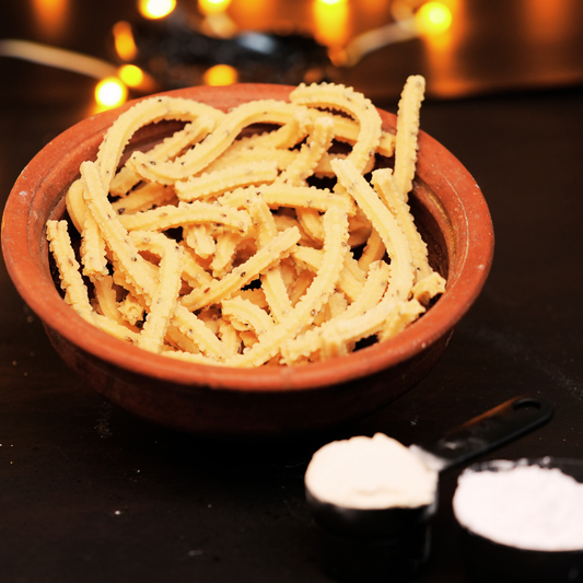 Close-up of crispy golden Andhra Ring Murukku with sesame seeds – no maida, no palm oil, no preservatives by Dr. Renga's