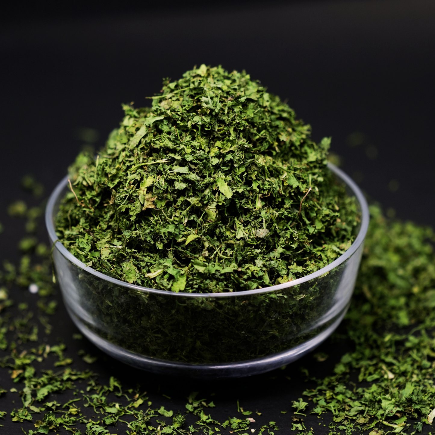 Solar dried coriander leaves used as garnish over hot dal curry and biryani