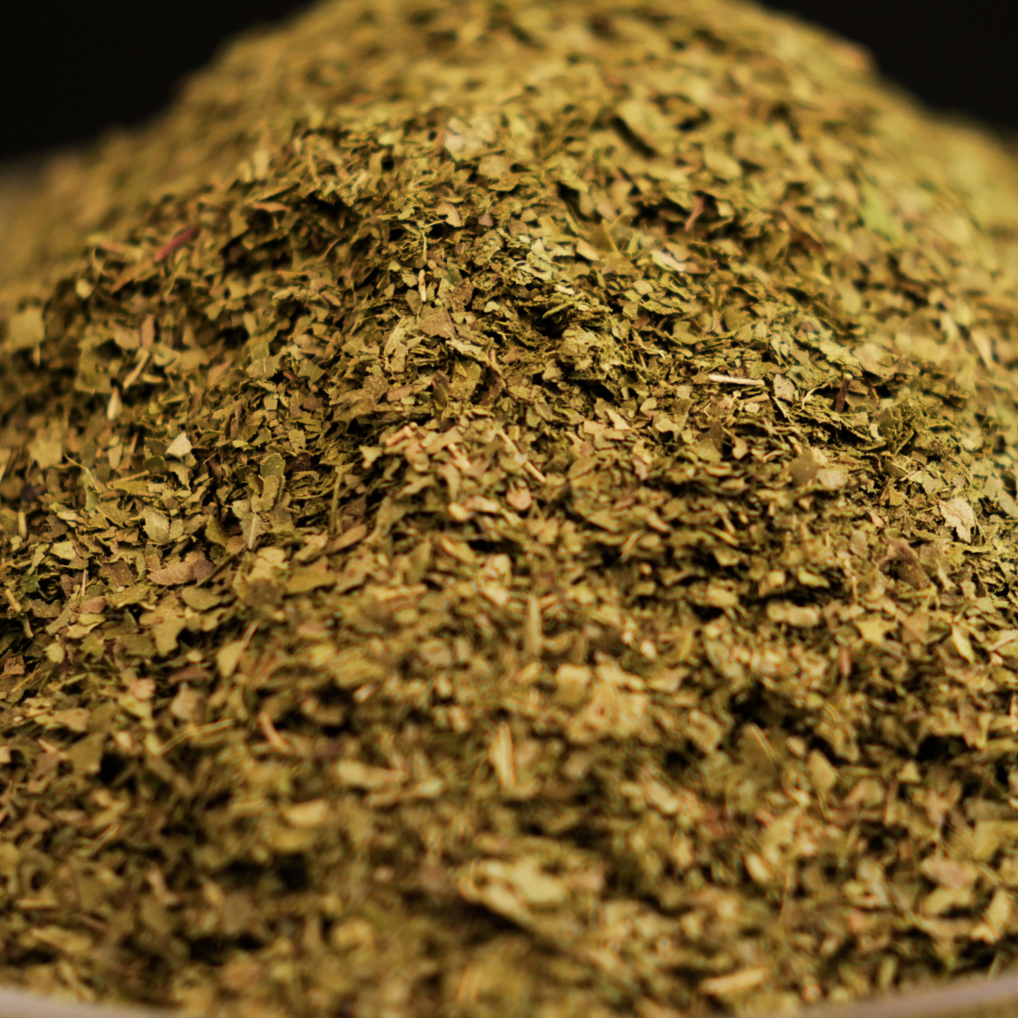 Solar dried curry leaves T cut sizzling in hot oil for South Indian tempering and tadka