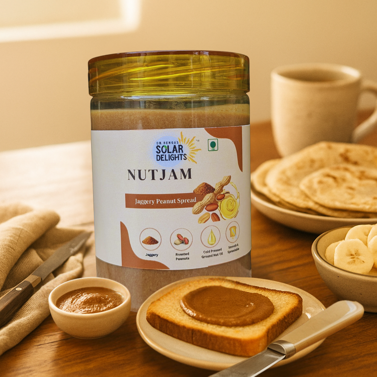 Jar of Nutjam spread on a table with toast and bananas