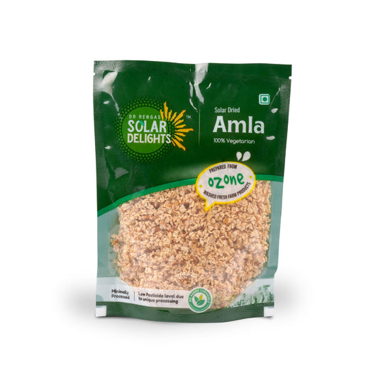 Close-up of tangy salted amla pieces in eco-friendly packaging