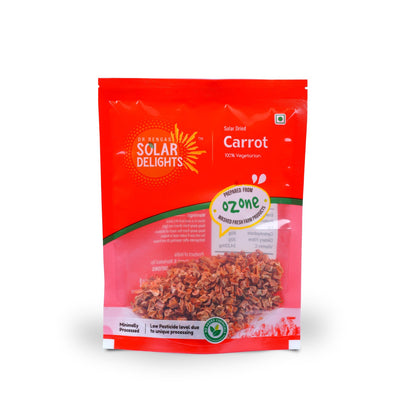 Front view of bright orange carrot cubes neatly packed in eco-friendly pouch