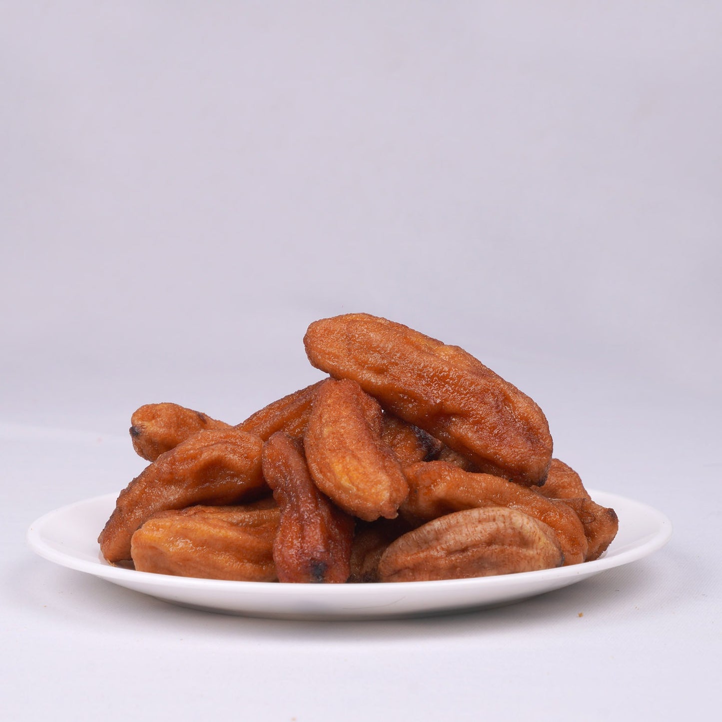 Assorted premium dry fruits featuring Dr. Renga’s Solar Delights dried bananas – naturally dehydrated and solar dried.