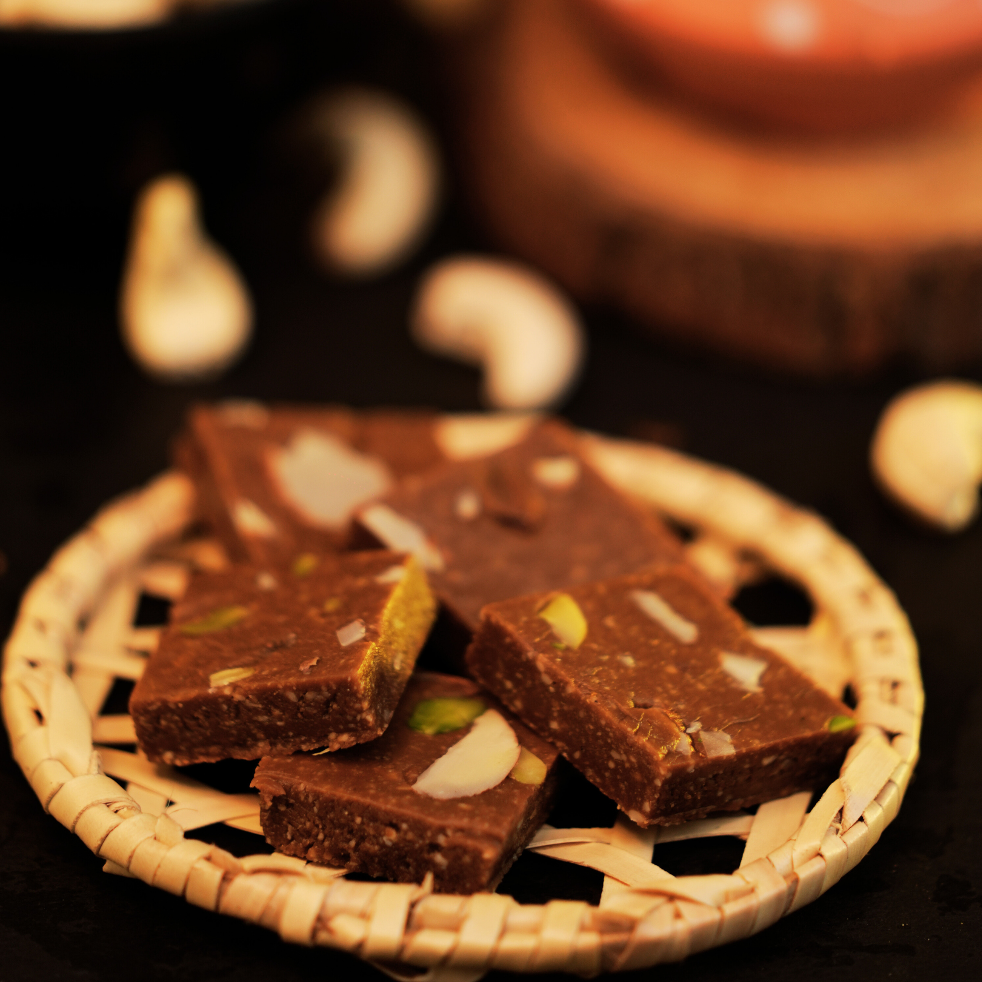 Premium cashew kaju katli made with nutrient-rich vacuum evaporated jaggery and pure ghee.