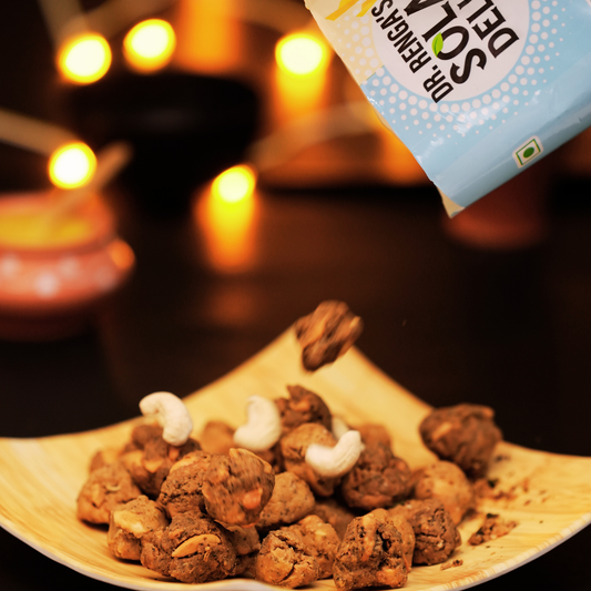 Close-up of golden crispy kaju pakoda with whole cashews – no maida, no refined oil by Dr. Renga's Solar Delights