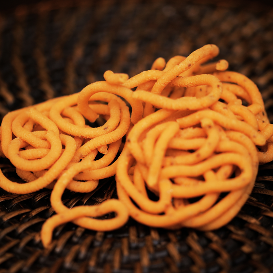 Close-up of golden crispy spiral murukku – no maida, no refined oil, no preservatives by Dr. Renga's Solar Delights