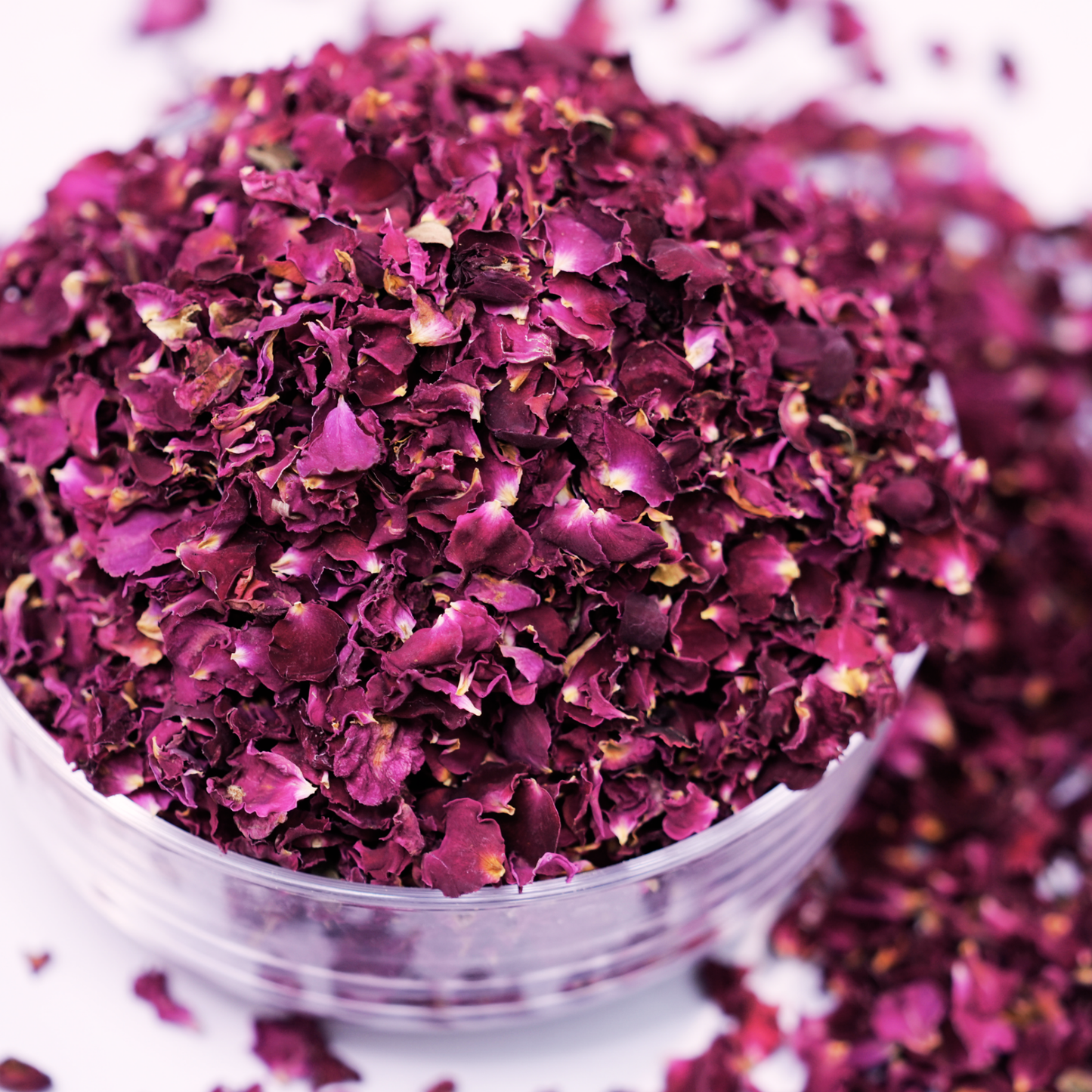 Close-up of solar dried rose petals showing soft blush pink colour and delicate petal texture